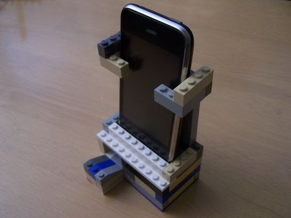 Lego iPhone Speaker Stand : This electricity-free Lego iPhone speaker amplifies the sound a little, but it's main purpose is to direct the sound in a more specific direction rather than all over the place like it usually does. And it's also a great iPhone stand. See the tutorial 