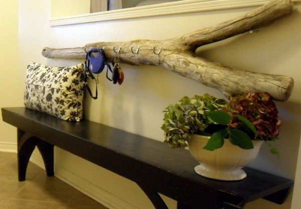 DIY Driftwood Key Holder. Driftwood is easy to find if you live somewhere near a beach. Drill holes to accommodate all hooks with screws. Then hang it up on your wall. It is a great place to hang your keys. See more instructions  