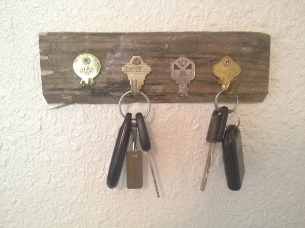 DIY Key Holder Using Old Keys. Here is another opinion regarding DIY key holders.  Get old and unwanted keys bent and secured them on a rectangle piece of wood.  A functional and cheap key holder is here for you. See how to do it  