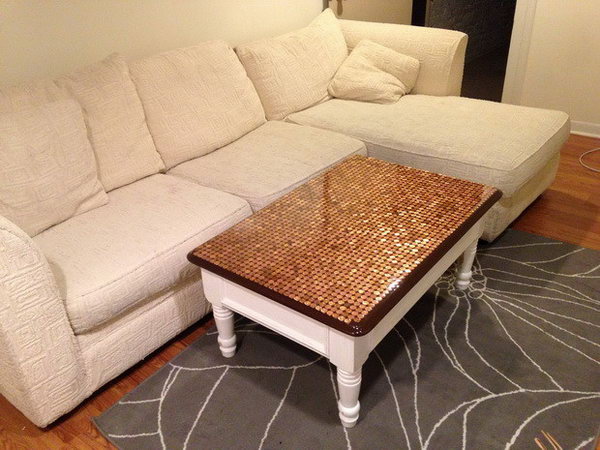  Penny Top Coffee Table DIY. Considering giving your coffee table a unique treatment. You can use a collection of pennies to give a copper patina to the tabletop. See how to do it 