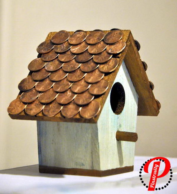 Penny Birdhouse. Enjoy watching birds outside of your kitchen window with this amazing DIY penny birdhouse. See how to do it 