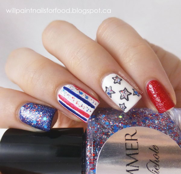 4th of July Glitter America Nail Art: Every single detail of this great nail is impressive. What gives this nail art a festive looking is the color scheme, the adding of some glitter polish, rhinestones. And I especially love the stars. Check out the tutorial here.