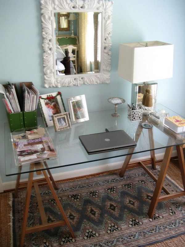 DIY Sawhorse Desk. This DIY sawhorse desk is not only classic but chic, especially with a glass top. Get the tutorial 