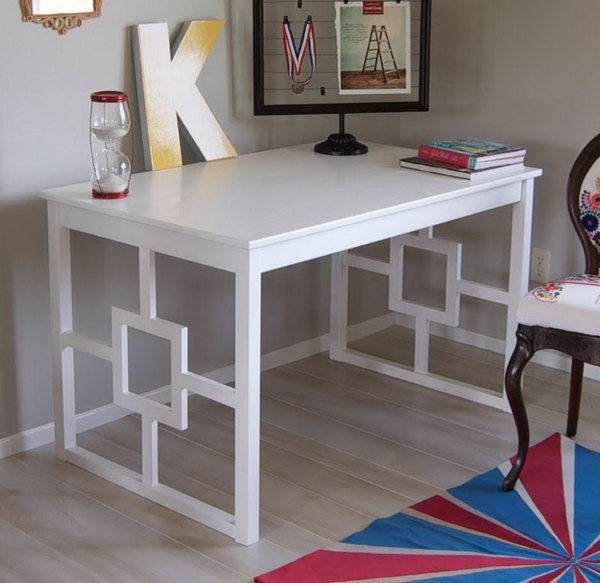 IKEA Chic Modern Desk. See how Katie turned a basic and unfinished IKEA Ingo dining table into a beautiful, chic modern desk with some white paint and a little bit of puzzling together at Matsutake blog.