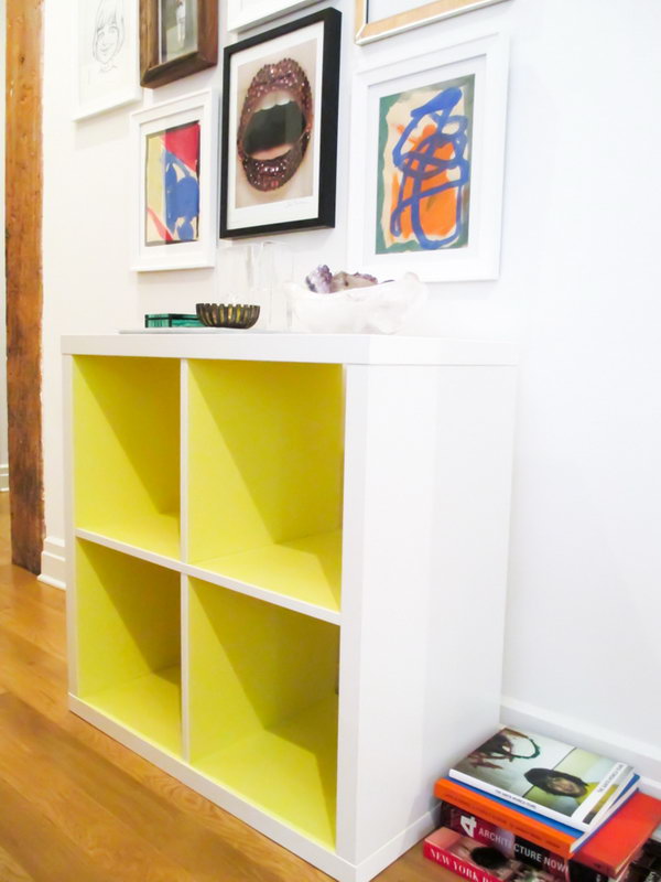 DIY Kallax Shelf in Neon Yellow. Super easy to use contact paper to upgrade for your simple Kallax pieces from IKEA.  Look at this one in Neon yellow. Isn’t it just the amazing? See the full tutorial 