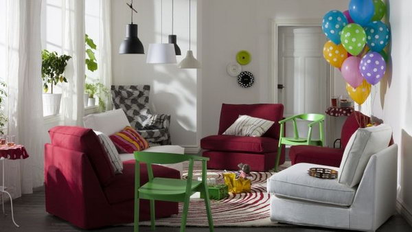 Living Room Cheered Up by Colors.  Bring some brightness into your small living room with colorful accent furniture and accessories. Look at this example from IKEA. The red sofas, green chairs and colorful balloons, rainbow throws really pop up this small living space.
