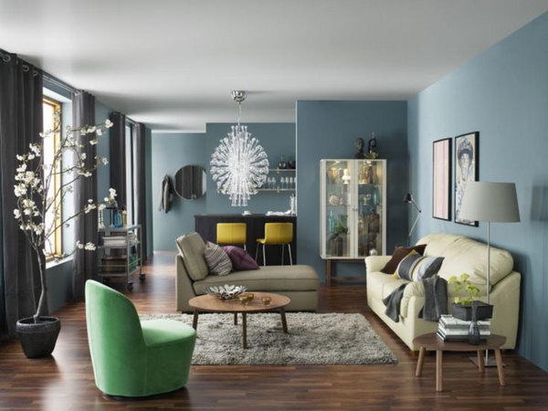 Blue is a popular color during the summer time. The blue-painted walls make a sophisticated and chic living room. Every wall can be a stunning display place in your living space.