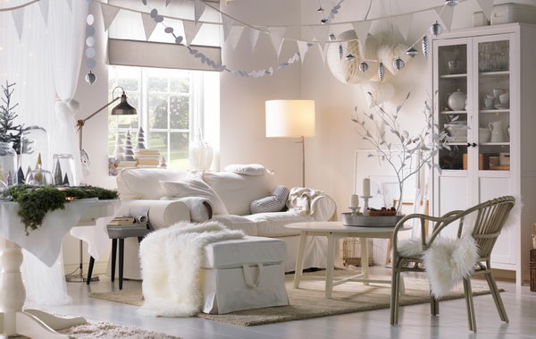 Living Room Inspired by Winter. This living room can be called a white winter wonderland with the lighting, soft textiles, snow globes and decorative paper chains.  All of these keep the fairytale and romance feeling alive in the room.