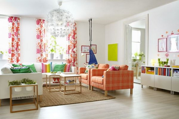 Living Room with Spring Colors. Beautiful curtains, the brown  sofa and the rainbow pillows refresh this living room and let you enjoy the warm days ahead. The oversized pendant light also brings out the POP.