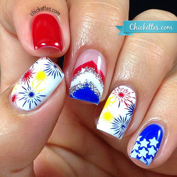 Glittery Fireworks Nails: This is quite a sparkling festive manicure to celebrate the great birthday of America! The idea of sliver, white, blue and red stripes is so creative. With this manicure, you're sure to be rocking. 