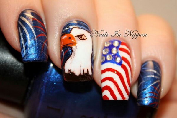 Cool and Glittery: Cool eagle, fireworks and stripes manicure with a glittery crystal accent nail. See how to here.