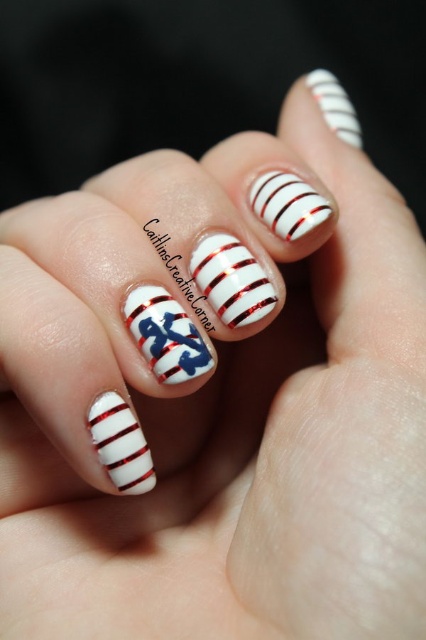 Nautical 4th of July Stripes with an Anchor Accented Nails: This beautiful nautical theme inspired nail art is easy to recreate. Use red metallic striping tape to add stripes onto the base and use a dotting tool to paint the anchor. You're able to get the fancy look.