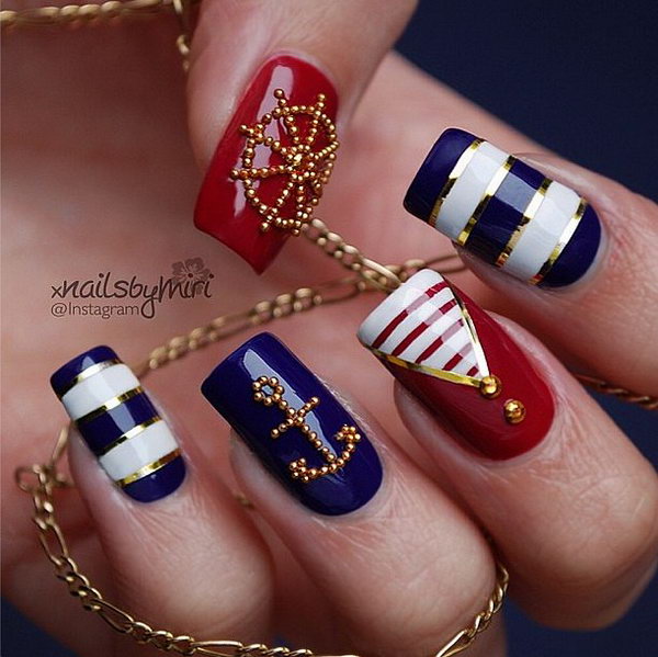 Patriotic Nautical Long Nails: With the meticulous anchor and wheel arrangements of those little gold beads, this manicure looks really luxury and fancy.