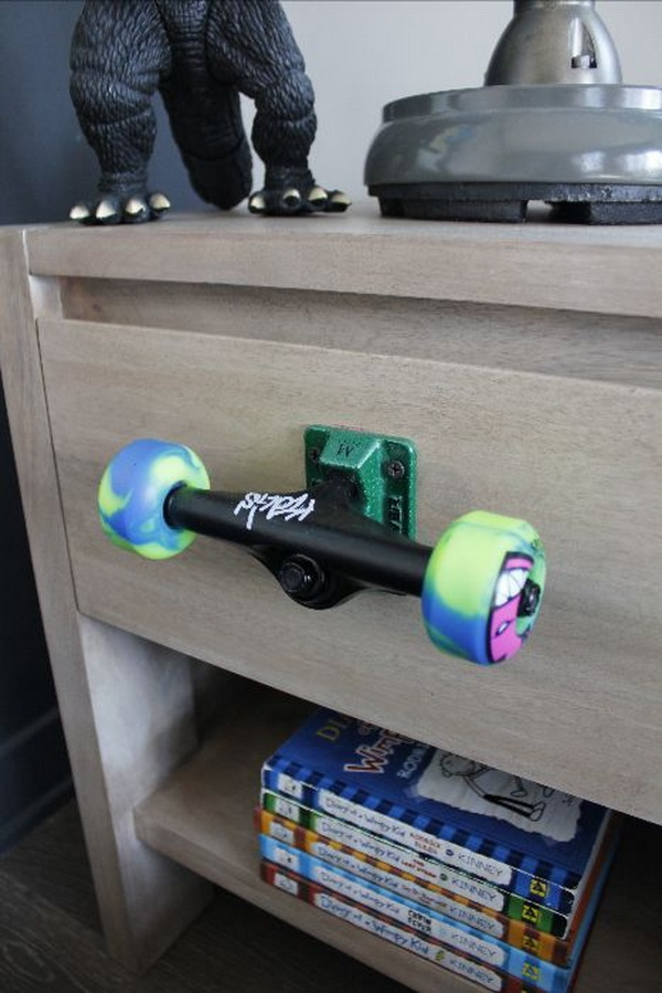 Recycled Skateboard Wheels Drawer Pull. What a cool idea for a teen boy bedroom! 