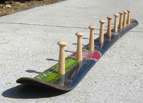 DIY Skateboard Coat Rack: For your coats, you can design a skateboard coat rack that is just for you. To make one, you need to drill some holes and get yourself some hooks! 
