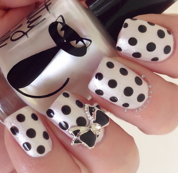 Pearl and Black Polka Dot Nails With Black and Silver Bow. 