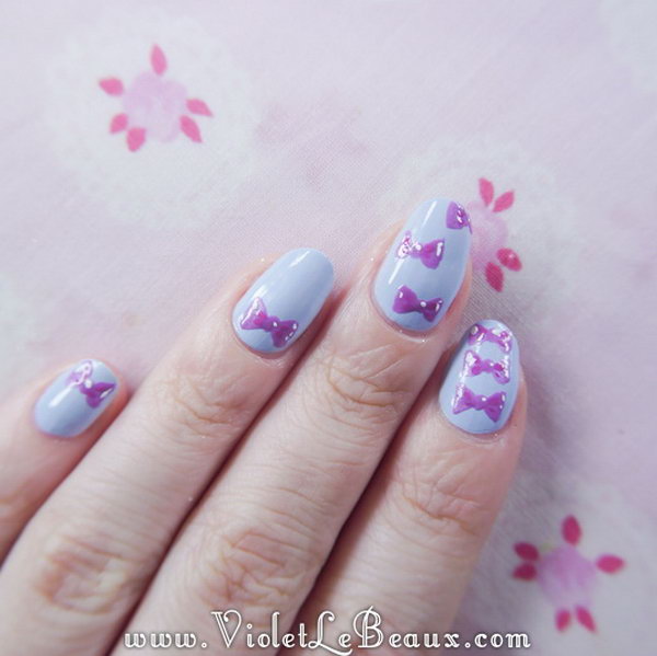 Purple Bow Nails. See the tutorial 