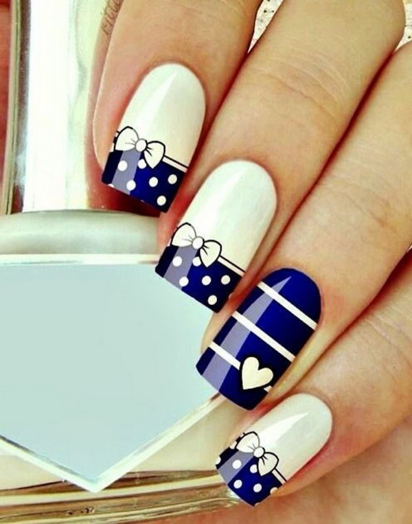 Navy and White Nails with Polka Dots , Stripes and Bows. 