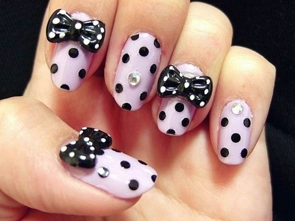 Dotted Nail Art with Black Bows. 