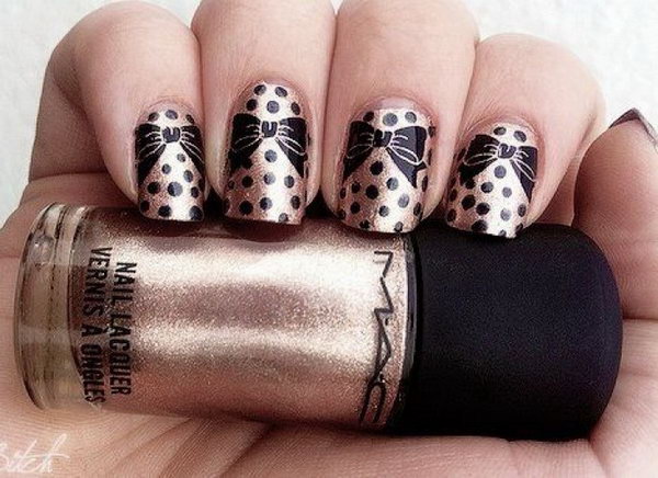 Golden Nail Art with Lovely Bows. 
