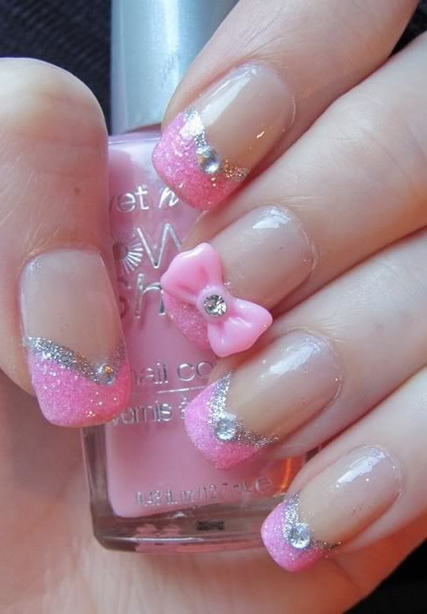 Pretty Pink Nail Design with Glitter, Rhinestones and a Pretty Pink Bow.