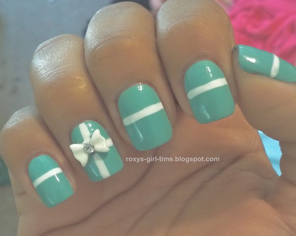 Green Nails with White Bow and Strips. See more details 