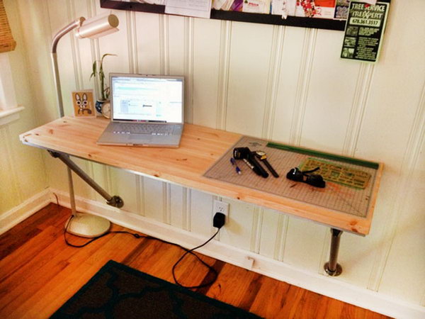 Wall Mounted Desk with Angled Supports. This simple but stunning desk leverages existing structures to save you time and money. The instructions are easy-to-follow and make for a fantastic weekend project if you’re looking to create a custom desk area. 