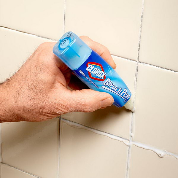 Use Bleach Pen to Clean Grout between the Tiles. Tutorial via 