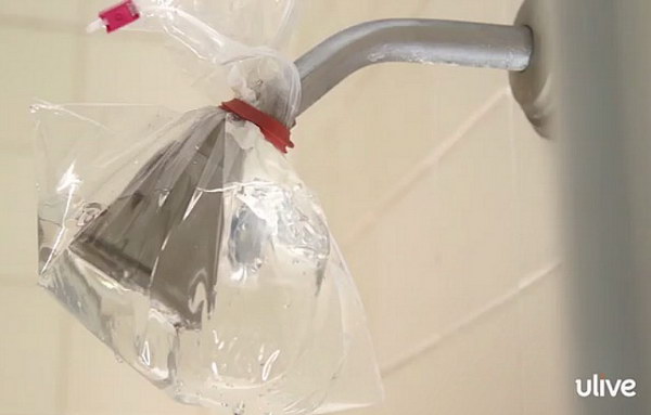 How to Clean the Shower Head Easily. Clean your shower head using a bag with vinegar. Get the video tutorial  