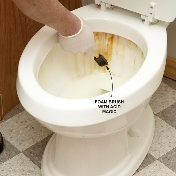 Remove stubborn rust stains from the toilet using foam brush and acid magic. 