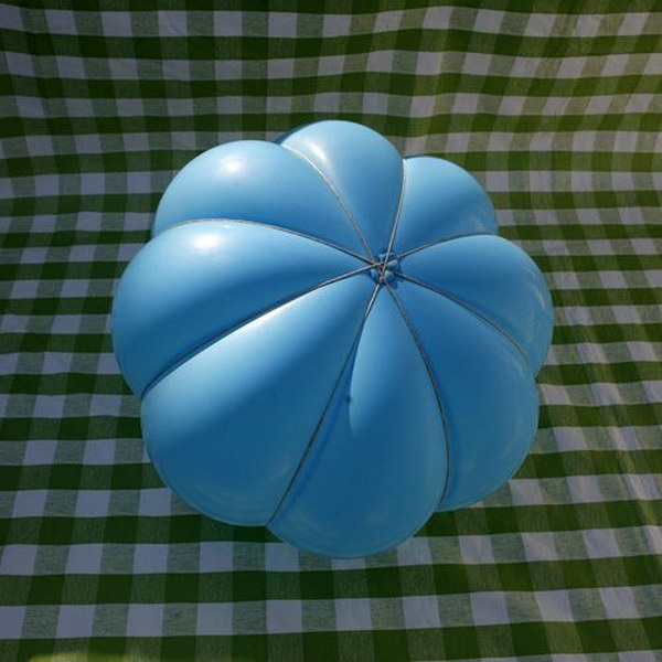 Make a Paper Mache Pumpkin for Fall with Balloon. 