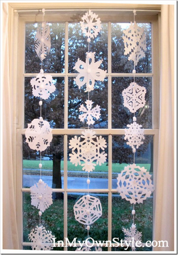 DIY Hanging Paper Snowflake Window Treatment. 
