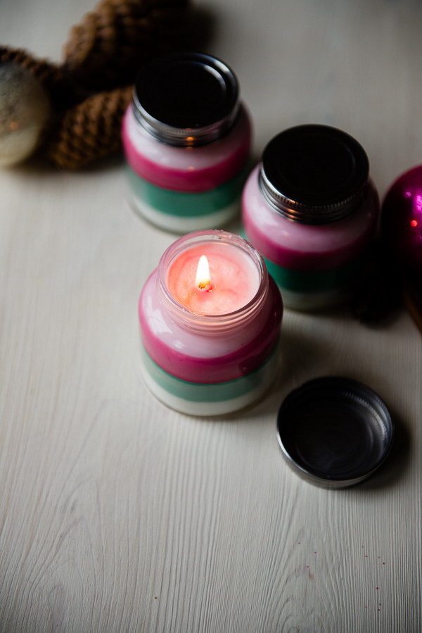 DIY Layered Scent Holiday Candles. Layered scent holiday candles are so much fun and super easy to make. Your house will filled with the delicious scent of peppermint, or balsam or frankincense wafts when the candles burn. You can also make them as homemade gifts to your friends. 