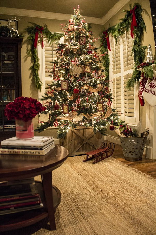 Red, Silver and Jute Ribbon Christmas Tree. This Christmas tree decor adds to a cozy and rustic feel to the space. Especially love the traditional look and the wooden crate as the Christmas tree stand. 