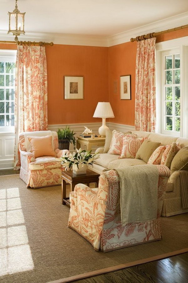 Living Room With Orange Wall, Chairs and Curtains. 