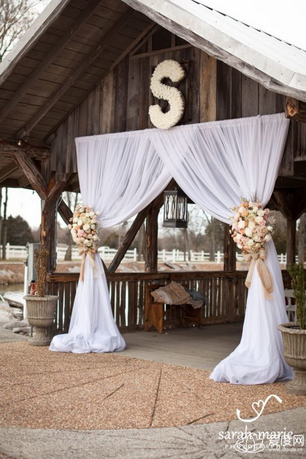 Wedding Venue with Draped Fabric for Dramatic Entrance  