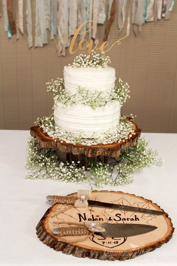 Rustic Wedding Cake with Tree Stump and Baby Breath 