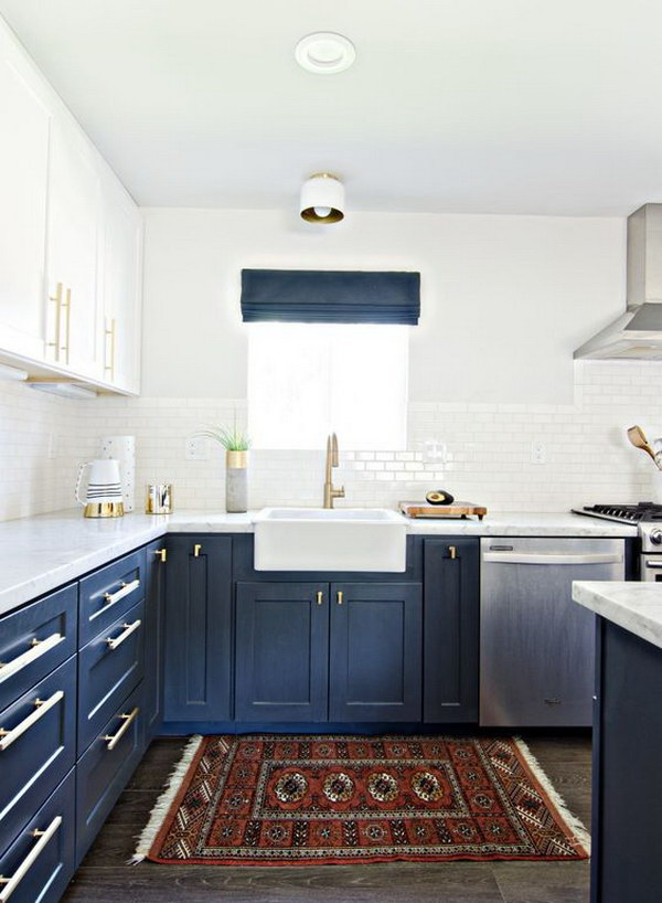 Navy Blue and White Kitchen Cabinets with Gold Hardware. 