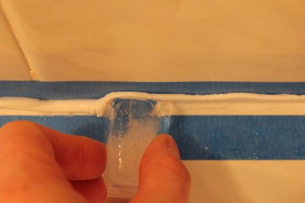 Smooth The Finished Line Of Caulk With An Ice Cube. 