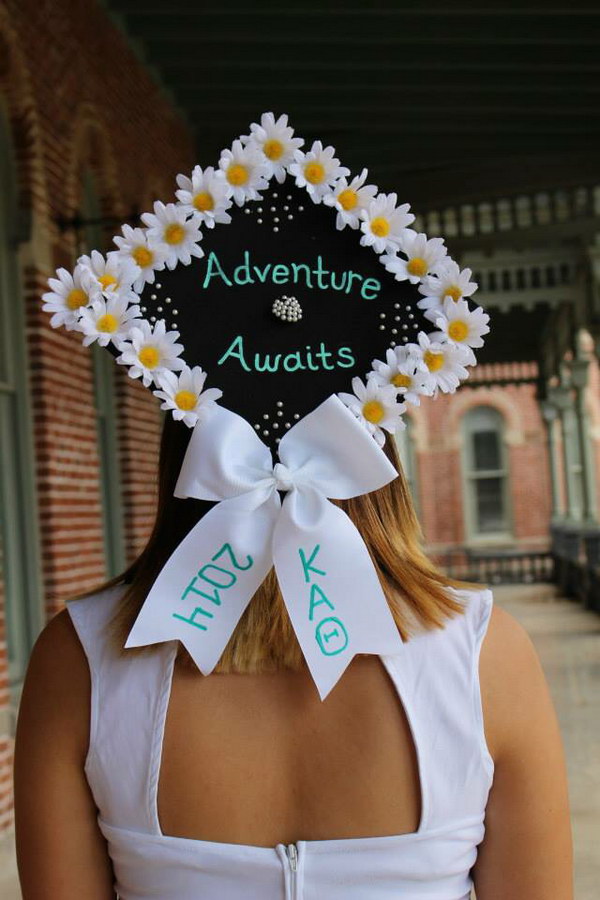 Graduation Cap Decorated with Flowers and a Bow. 