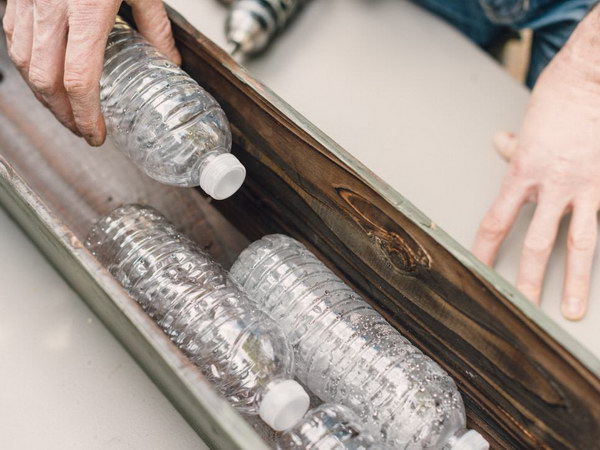 Put Plastic Bottles In Window Boxes For Proper Drainage. 