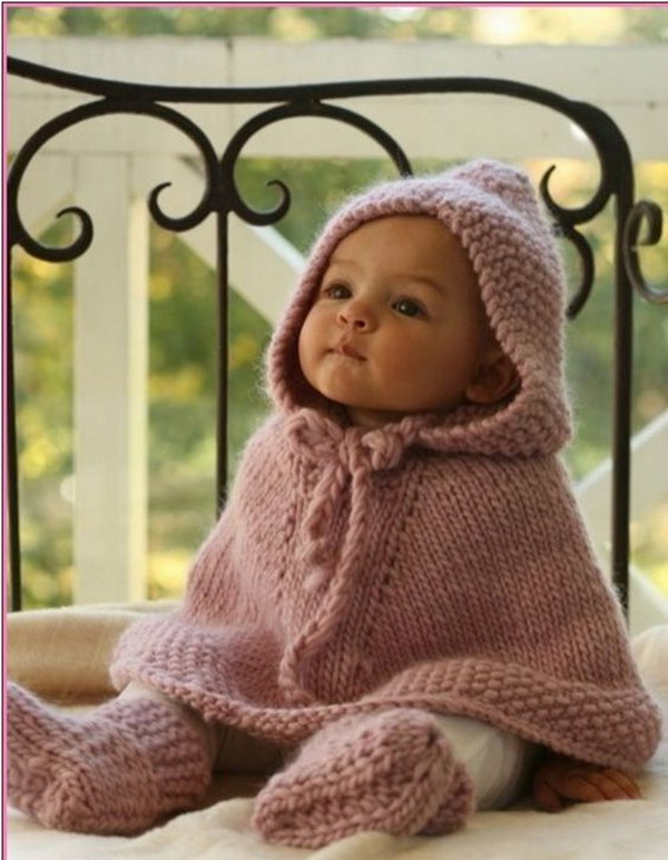 Knitted poncho with hood and booties. 