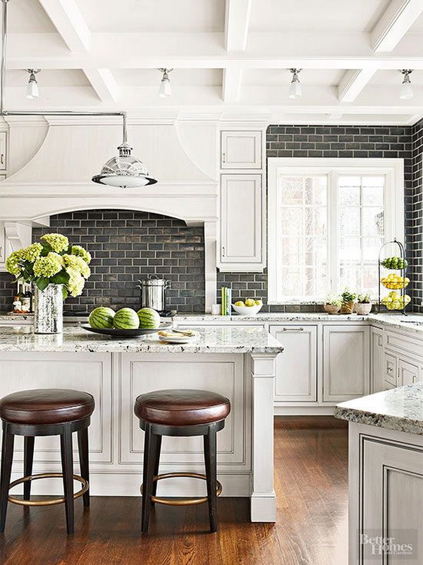 White Kitchen with a Black Subway Tile Backsplash 