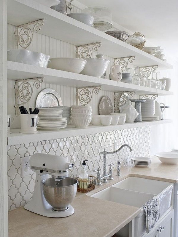 White Kitchen with Moroccan Tile Back Splash Beneath the Openshelves  