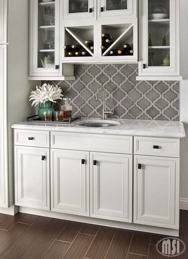 Grey Arabesque Shape Mosaic Tile Backsplash against White Cabinets