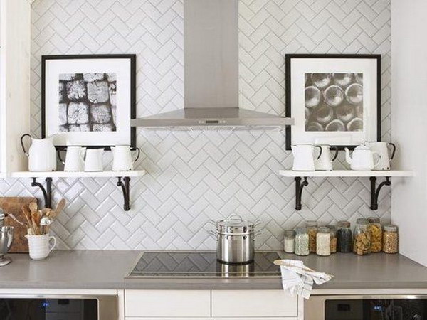 White Herringbone Subway Tile Backsplash Teams with Grey Countertops 