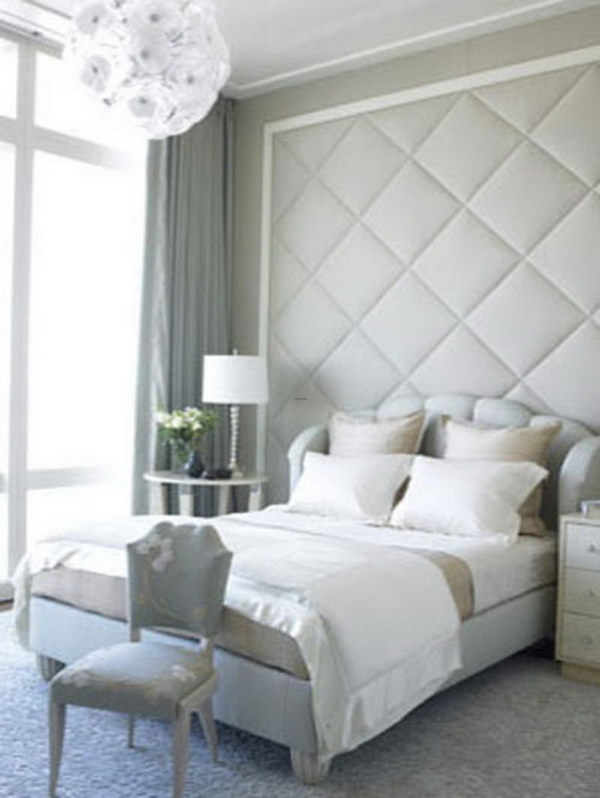 reate a focal point with floor to ceiling headboard. 