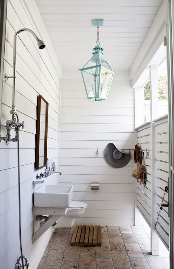Farmhouse Outdoor Shower With a Turquoise Chandelier. 