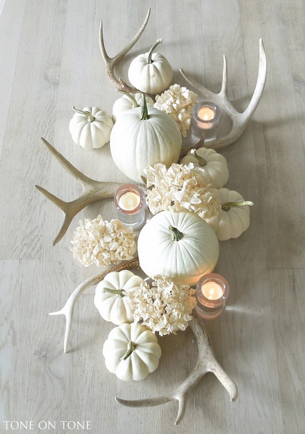 Stunning Fall Centerpiece with Antlers, Pumpkins, and Hydrangeas. 