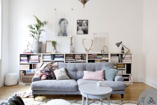 Small Bookcase Behind The Couch For Easy Access. 